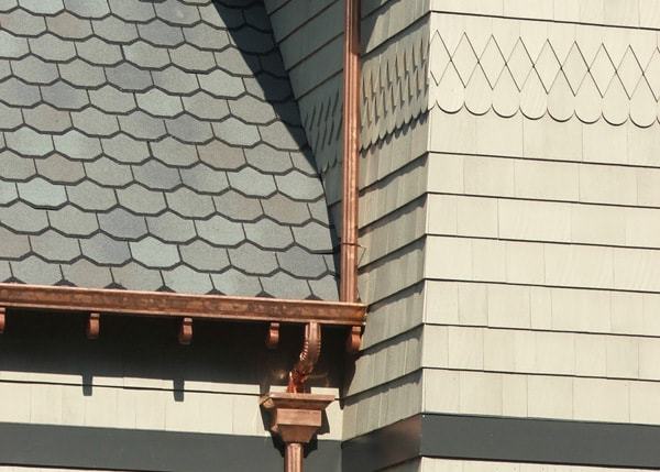 Copper gutter and copper downspout with copper leaderhead
